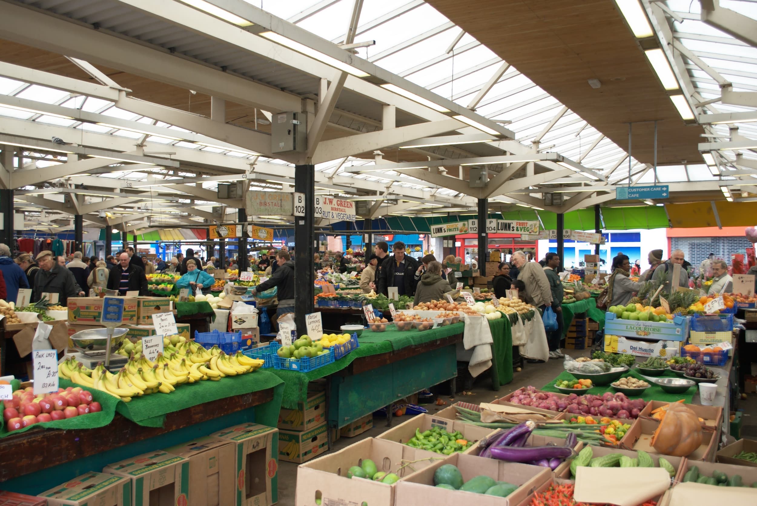 Colourful fruit and vegetable stalls at Leicester Market